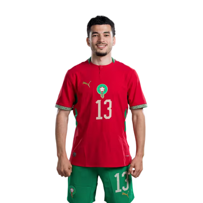 Morocco national football team 2026 World Cup jersey (Player/Match version) — Defenders: No. 13 Zakaria El Ouahdi, No. 14 Issa Diop, No. 18 Chadi Riad./ المدافعون: رقم 13 زكريا الواحدي، رقم 14 عيسى ديوب، رقم 18 شادي رياض.