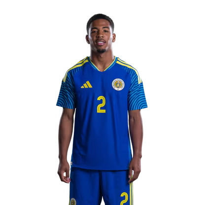 2026 World Cup Curaçao national football team jerseys (player/match version) — Defenders: No. 2 Shrandy Sambo, No. 3 Julien Gary, and No. 4 Rochon Van Eijma/Defensornan: No. 2 Shrandy Sambo, No. 3 Julien Gari, i No. 4 Rochon Van Eijma.