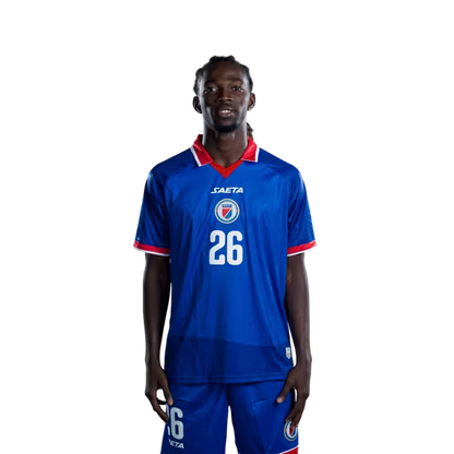 Mayo foutbòl koup di mond Ayiti 2026 vèsyon jwè vèsyon match - Miliye teren nimewo 25 Dominique SIMON, nimewo 26 Woodensky PIERRE